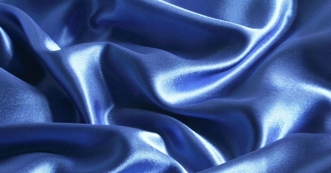 Blue, shiny, smooth fabric made of lyocell fibers