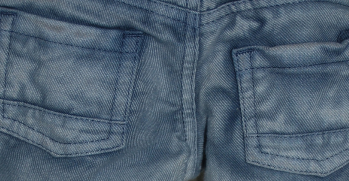 Light blue pair of jeans with chiaro-scuro effect